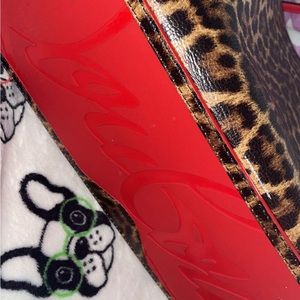 christian louboutin bag comes with us bag like brand new. Cheetah print